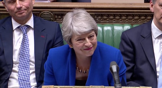 UK PM Theresa May fights back tears as she is applauded out of parliament