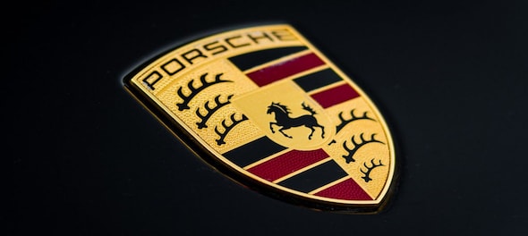 Porsche posts record earnings, sets long-term margin goal of 20%