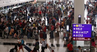 Hong Kong's airport reopens, more than 200 flights cancelled