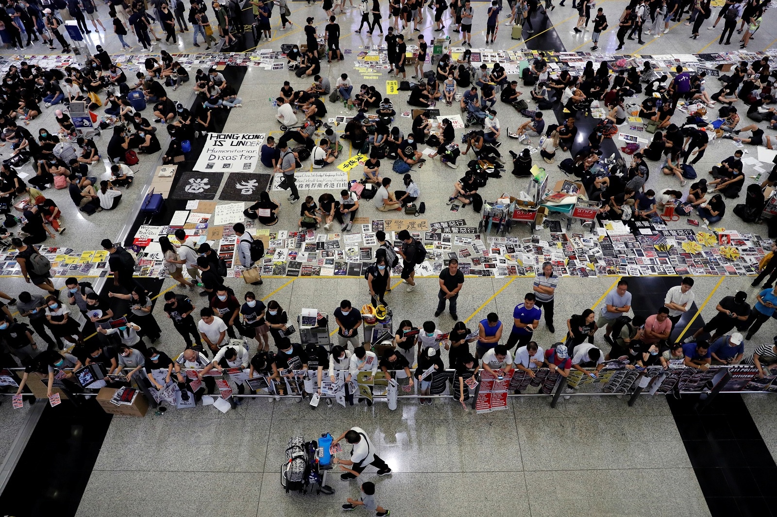 Police, Protesters Clash At Hong Kong Airport After Flights Halted For ...