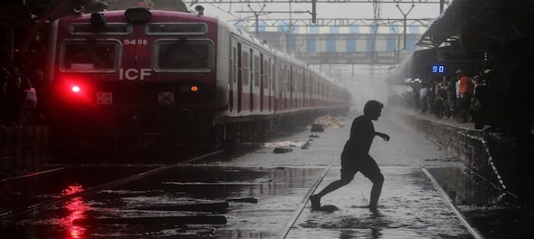 Mumbai Rains Latest: IMD raises alert to 'red'; air, train services hit