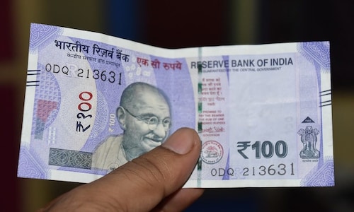 Rupee opens on a nearly flat note against dollar