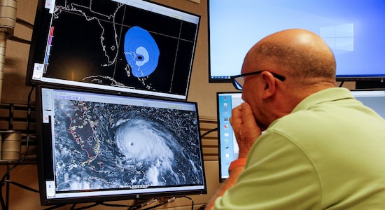 Dr Lixion Avila, Senior Hurricane Specialist, prepares a forecast at the National Hurricane Center ahead of the arrival of Hurricane Dorian in Miami, Florida, U.S. September 1, 2019. REUTERS/Joe Skipper