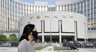 China's central bank cuts benchmark lending rate for first time since April 2020