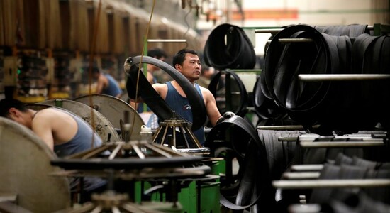 Asian factories lashed by trade wars, slowing demand in August