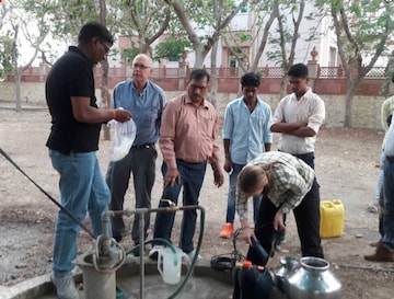 Researchers sampling groundwater wells for a study that draws attention to the co-occurrence of human-made pollutants and naturally occurring toxic minerals spoiling groundwater quality in Rajasthan. Photo by Anjali Singh.
