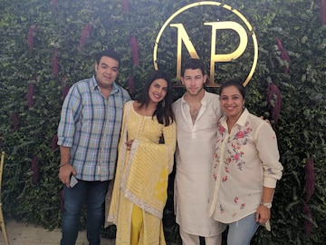 Tina Tharwani and Saurabh Malhotra with Priyanka Chopra and Nick Jonas on their engagement