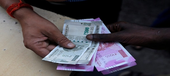 Rupee slumps 16 paise to 76.72 against US dollar in early trade