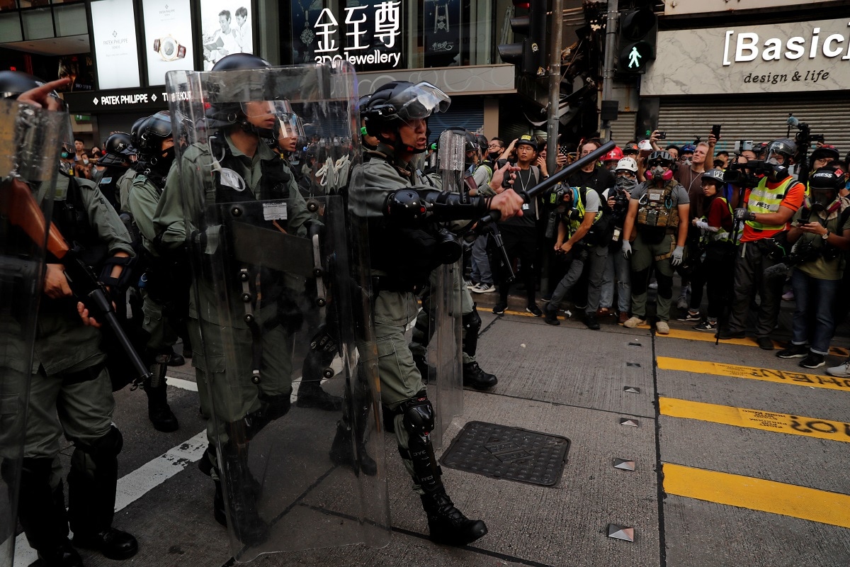 Hong Kong protesters, police in dusk standoff after tear ...