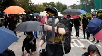 Hong Kong police fire tear gas as transport chaos grips city