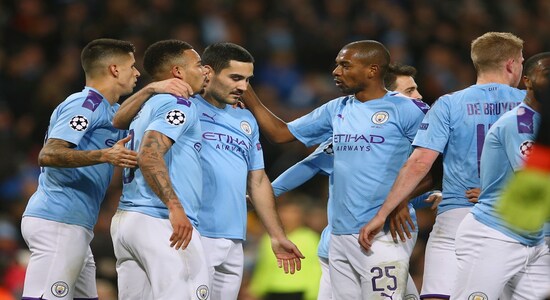 Manchester City players celebrate with Ilkay Gundogan, center, after he scored his side's first goal during the group C Champions League soccer match between Manchester City and Shakhtar Donetsk at the Etihad Stadium in Manchester, England, Tuesday, Nov. 26, 2019. (AP Photo/Dave Thompson) Manchester City players celebrate with Ilkay Gundogan, center, after he scored his side's first goal during the group C Champions League soccer match between Manchester City and Shakhtar Donetsk at the Etihad Stadium in Manchester, England, Tuesday, Nov. 26, 2019. (AP Photo/Dave Thompson)