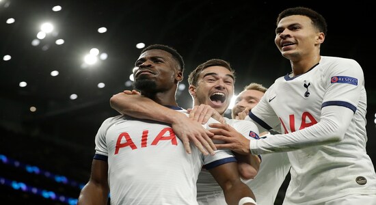 Tottenham's Serge Aurier, left, celebrates his goal with Tottenham's Harry Winks, centre, and Tottenham's Dele Alli, right, during the Champions League Group B soccer match between Tottenham Hotspur and Olympiakos at the Tottenham Hotspur Stadium in London, Tuesday, Nov. 26, 2019. (AP Photo/Matt Dunham) Tottenham's Serge Aurier, left, celebrates his goal with Tottenham's Harry Winks, centre, and Tottenham's Dele Alli, right, during the Champions League Group B soccer match between Tottenham Hotspur and Olympiakos at the Tottenham Hotspur Stadium in London, Tuesday, Nov. 26, 2019. (AP Photo/Matt Dunham)