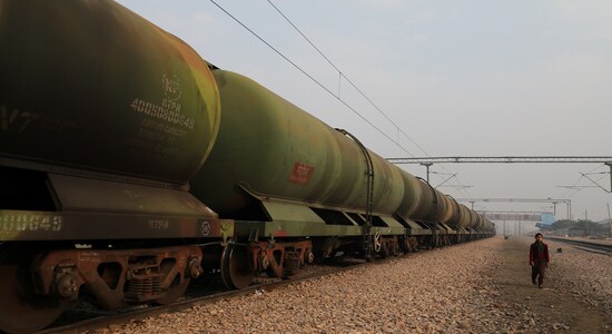 A boy walks past an oil tanker train stationed at a railway station in Ghaziabad, on the outskirts of New Delhi, February 1, 2019. REUTERS/Anushree Fadnavis/File Photo A boy walks past an oil tanker train stationed at a railway station in Ghaziabad, on the outskirts of New Delhi, February 1, 2019. REUTERS/Anushree Fadnavis/File Photo