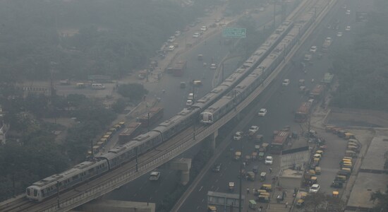 Metro trains move on a foggy morning in Noida on the outskirts of New Delhi, India, November 14, 2019. REUTERS/Anushree Fadnavis Metro trains move on a foggy morning in Noida on the outskirts of New Delhi, India, November 14, 2019. REUTERS/Anushree Fadnavis