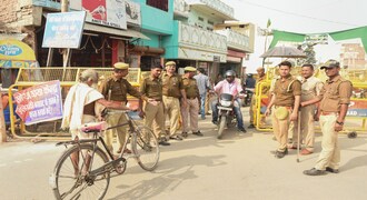 Ayodhya: Police personnel conduct searches near the site of disputed Ram Janambhoomi-Babri Masjid site, as the verdict date nears, in Ayodhya, Friday, Nov. 8, 2019. (PTI Photo/ Nand Kumar) (PTI11_8_2019_000081B)
