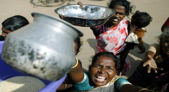FILE PHOTO: Indian tsunami survivors rush for food in Nagapattinam, south of the southern Indian city of Madras, December 31, 2004. REUTERS/Punit Paranjpe FILE PHOTO: Indian tsunami survivors rush for food in Nagapattinam, south of the southern Indian city of Madras, December 31, 2004. REUTERS/Punit Paranjpe
