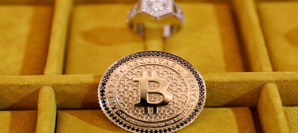 Early Christmas for bitcoin: Cryptocurrency sets new record at $19,860; one analyst sees $318,000 next year