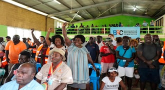 In this photo provided by the UN in Papua New Guinea, members of the Bougainville Women's Federation applaud after the results of an independence referendum were announced on Wednesday, December 11, 2019, in Buka, in Papua New Guinea.  The South Pacific region of Bougainville voted overwhelmingly to become the world's newest nation by gaining independence from Papua New Guinea.  (Serahphina Aupong / UN in PNG via AP)