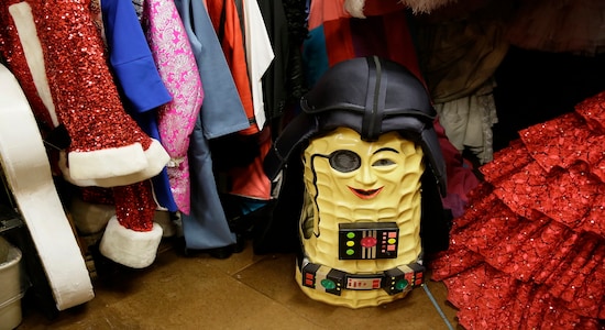 In this Tuesday, Nov. 19, 2019 photo, a costume hat depicting Mr. Peanut sits in the backstage dressing room of the musical &quot;Beach Blanket Babylon&quot; in San Francisco. The final performance of the small campy San Francisco show is set for New Year's Eve. (AP Photo/Eric Risberg)