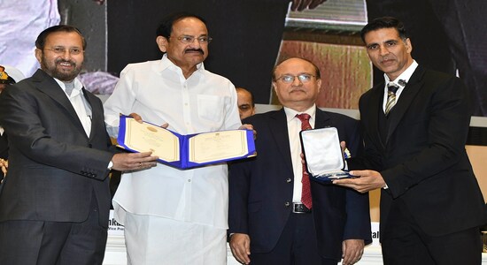 Vice President Venkaiah Naidu, second left, presents the award for best film on social issues to Padman, being received by Bollywood actor Akshay Kumar, right, during the national film awards ceremony in New Delhi, India, Monday, Dec.23, 2019. Information and Broadcasting Minister Prakash Javdekar is on left. (AP Photo) Vice President Venkaiah Naidu, second left, presents the award for best film on social issues to Padman, being received by Bollywood actor Akshay Kumar, right, during the national film awards ceremony in New Delhi, India, Monday, Dec.23, 2019. Information and Broadcasting Minister Prakash Javdekar is on left. (AP Photo)