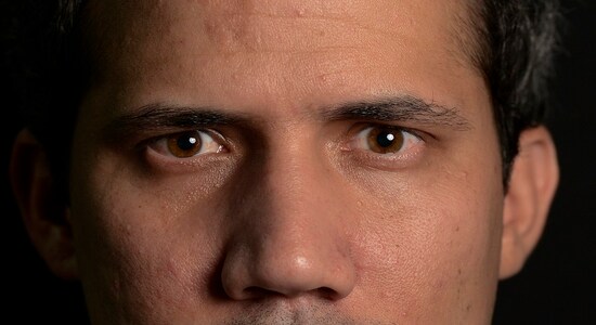 In this photo taken on Dec. 16, 2019 and published on Dec. 23, Venezuela's National Assembly President and self-proclaimed interim President Juan Guaido poses for a photo during an interview in Caracas, Venezuela. Guaido, the hand-picked successor to then-detained opposition leader Leopoldo Lopez, leaped onto the stage in January at a dark moment in the once-wealthy nation's history. (AP Photo/Matias Delacroix) In this photo taken on Dec. 16, 2019 and published on Dec. 23, Venezuela's National Assembly President and self-proclaimed interim President Juan Guaido poses for a photo during an interview in Caracas, Venezuela. Guaido, the hand-picked successor to then-detained opposition leader Leopoldo Lopez, leaped onto the stage in January at a dark moment in the once-wealthy nation's history. (AP Photo/Matias Delacroix)
