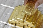 Gold prices today: The yellow metal shines as dollar slides marginally
