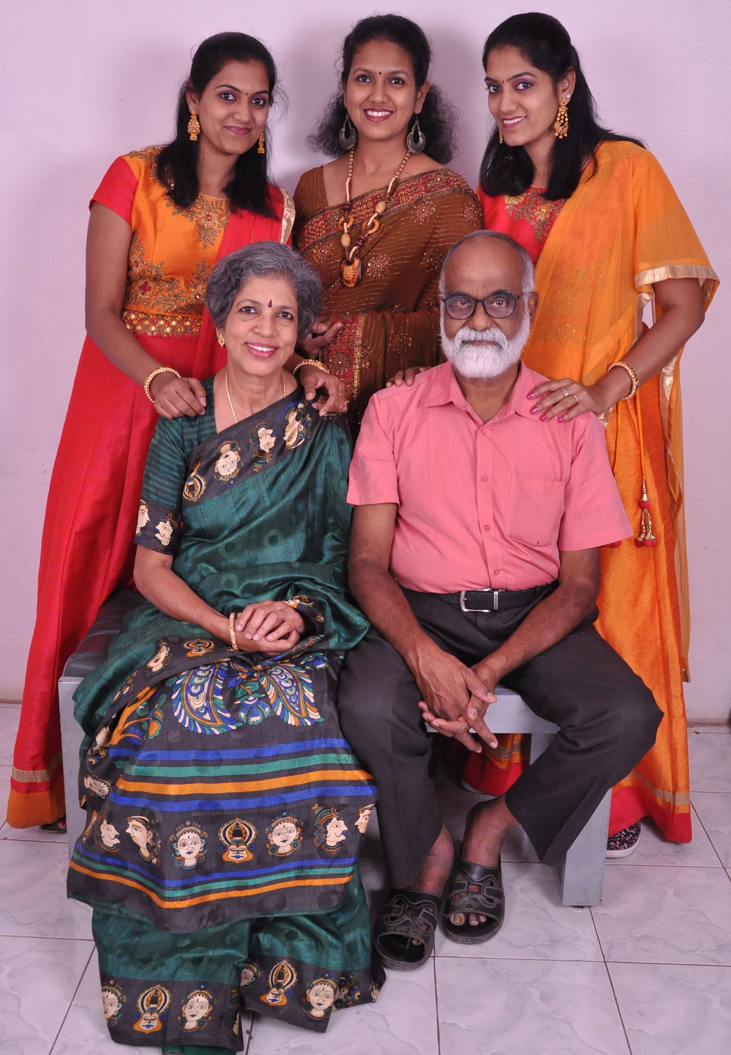 L-R: The twins with their sister Charumathy, father K.V. Jayaraman, and mother Jayam.