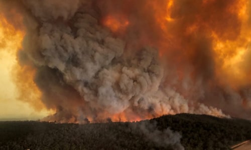 In Pictures: Thousands flee as Australian wildfires worsen