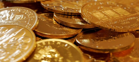 Gold prices steady as dollar retreats