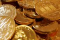 Gold gains as U.S. stimulus deal progress dents dollar