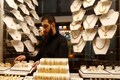 Gold dips as vaccine rollouts dent appeal