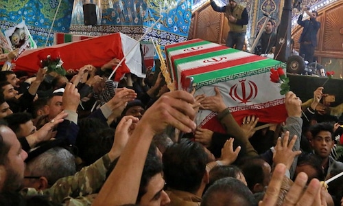 Soleimani's body arrives in Iran as Trump issues new threats