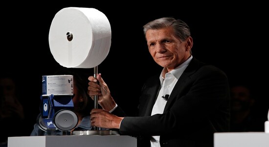 Procter &amp; Gamble Chief Brand Officer Marc Pritchard shows off the Charmin Forever Roll and the Charmin RollBot during a Procter &amp; Gamble news conference before CES International, Sunday, Jan. 5, 2020, in Las Vegas. (AP Photo/John Locher)