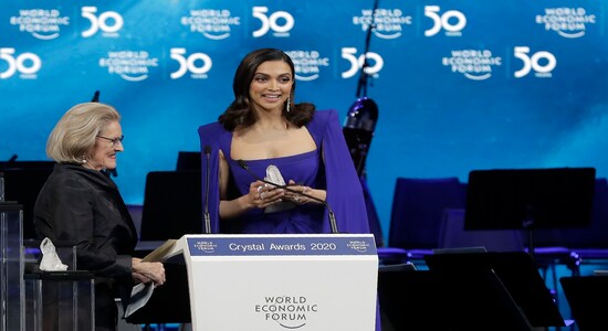 Actress Deepika Padukone, from India, receives a Crystal Award from Hilde Schwab, Chairwoman and Co-Founder of the World Economic Forum's World Arts Forum, during the ceremony for the Crystal Awards at the annual meeting of the World Economic Forumin Davos, Switzerland, Monday, Jan. 20, 2020. The 50th annual meeting of the forum will take place in Davos from Jan. 21 until Jan. 24, 2020. (AP Photo/Markus Schreiber)