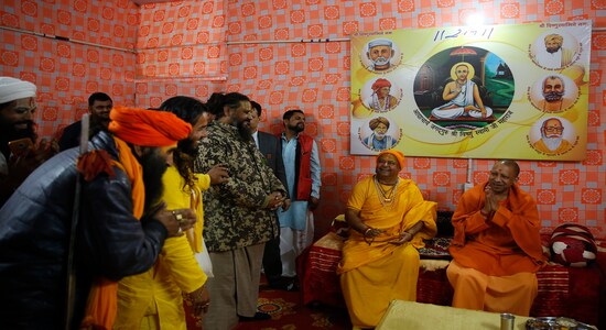 Uttar Pradesh state Chief Minister Yogi Adityanath, right, meets Hindu religious leaders at the Sangam, the confluence of rivers Ganges and Yamuna, on the eve of the Basant Panchami festival in Prayagraj, India, Wednesday, Jan. 29, 2020. (AP Photo/Rajesh Kumar Singh) Uttar Pradesh state Chief Minister Yogi Adityanath, right, meets Hindu religious leaders at the Sangam, the confluence of rivers Ganges and Yamuna, on the eve of the Basant Panchami festival in Prayagraj, India, Wednesday, Jan. 29, 2020. (AP Photo/Rajesh Kumar Singh)
