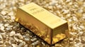 Gold hovers near 2-week low on hopes of economic recovery