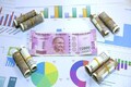 Rupee trims early gains to end flat at 74.41 against US dollar