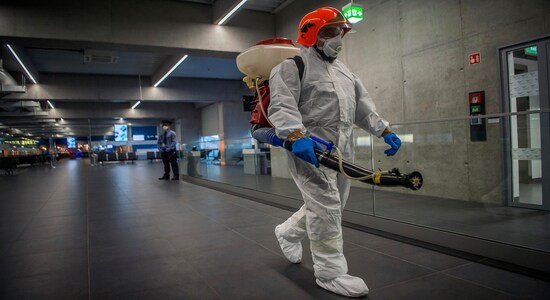 Disinfection equipment is carried by a worker as precautionary measures against the spreading of novel coronavirus, at Budapest Liszt Ferenc International Airport in Budapest, Hungary, Wednesday, Feb. 5, 2020. So far almost 900 passenger arriving directly from China have been examined at the airport. (Zoltan Balogh/MTI via AP) Disinfection equipment is carried by a worker as precautionary measures against the spreading of novel coronavirus, at Budapest Liszt Ferenc International Airport in Budapest, Hungary, Wednesday, Feb. 5, 2020. So far almost 900 passenger arriving directly from China have been examined at the airport. (Zoltan Balogh/MTI via AP)