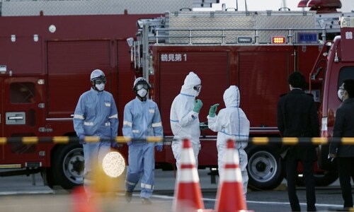 Japan bans new entries of foreigners after virus variant arrives