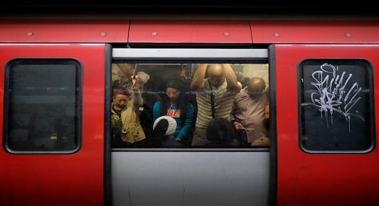 Commuters ride the subway in Caracas, Venezuela, Wednesday, Feb. 5, 2020. Venezuelan opposition leader Juan Guaido was in the chamber when President Donald Trump called him "the true and legitimate president of Venezuela" during his State of the Union speech on Feb. 4. (AP Photo/Matias Delacroix) Commuters ride the subway in Caracas, Venezuela, Wednesday, Feb. 5, 2020. Venezuelan opposition leader Juan Guaido was in the chamber when President Donald Trump called him "the true and legitimate president of Venezuela" during his State of the Union speech on Feb. 4. (AP Photo/Matias Delacroix)