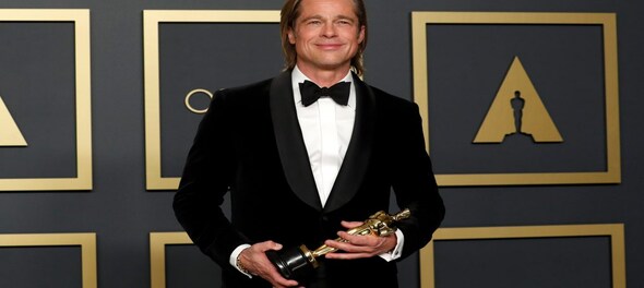 'Gobsmacked' Brad Pitt wins as Oscars gets underway