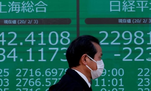 Asian stock markets fall as Powell warns on inflation