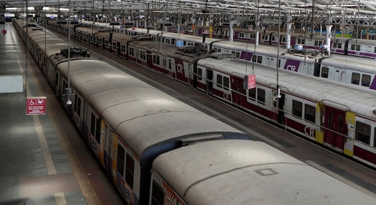 Trains stand parked at Chhatrapati Shivaji Maharaj Terminus after the country halted its railway network in Mumbai, India, Tuesday, March 24, 2020. India's colossal passenger railway system has come to a halt as officials take emergency measures to keep the coronavirus pandemic from spreading in the country of 1.3 billion. The railway system is often described as India's lifeline, transporting 23 million people across the vast subcontinent each day, some 8.4 billion passengers each year. (AP Photo/Rajanish Kakade)