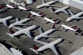 Stunning photos of international airlines using tarmacs to park airplanes amid coronavirus lockdown