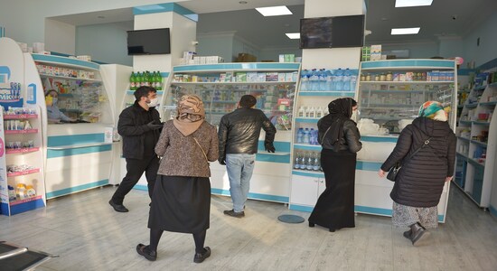 People visit a pharmacy in the Chechen capital Grozny, Russia April 4, 2020. The southern Russian region of Chechnya became the first to introduce a night curfew to try to prevent the spread of the coronavirus (COVID-19). REUTERS/Ramzan Musaev - RC2UXF9TV50M People visit a pharmacy in the Chechen capital Grozny, Russia April 4, 2020. The southern Russian region of Chechnya became the first to introduce a night curfew to try to prevent the spread of the coronavirus (COVID-19). REUTERS/Ramzan Musaev - RC2UXF9TV50M