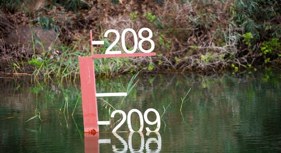 This Saturday, April 25, 2020 photo shows the sea water level meter in the Sea of Galilee, locally known as Lake Kinneret. After an especially rainy winter, the Sea of Galilee in northern Israel is at its highest level in two decades, but the beaches and major Christian sites along its banks are empty as authorities imposed a full lockdown. (AP Photo/Ariel Schalit) This Saturday, April 25, 2020 photo shows the sea water level meter in the Sea of Galilee, locally known as Lake Kinneret. After an especially rainy winter, the Sea of Galilee in northern Israel is at its highest level in two decades, but the beaches and major Christian sites along its banks are empty as authorities imposed a full lockdown. (AP Photo/Ariel Schalit)