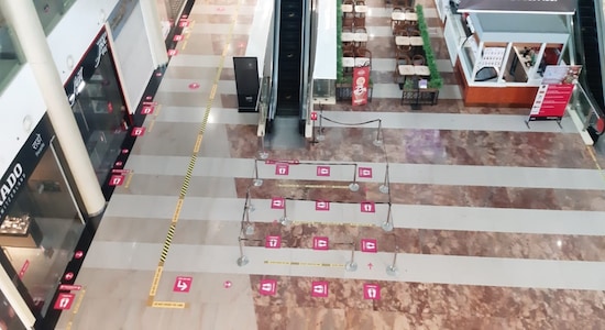 Image 4: Social distancing markers will be a visible aspect across all malls. Floor stickers will be placed on the ground to maintain six feet distance between individuals. Also, these floor stickers will help in unidirectional flow of people inside the malls. There will also be a limit on people going inside a particular shop and waiting customers will be made to stand outside on social distancing markers. Location: Viviana Mall, Thane Image Courtesy: Anurag Tiwari