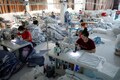 Asia's factory pain eases as region emerges from pandemic