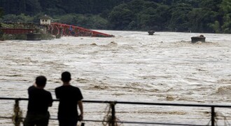 Japan floods, mudslides kill at least 44 as streets turn to rivers