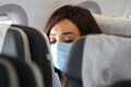 WHO backs face mask wearing on long flights as new Omicron variant spreads